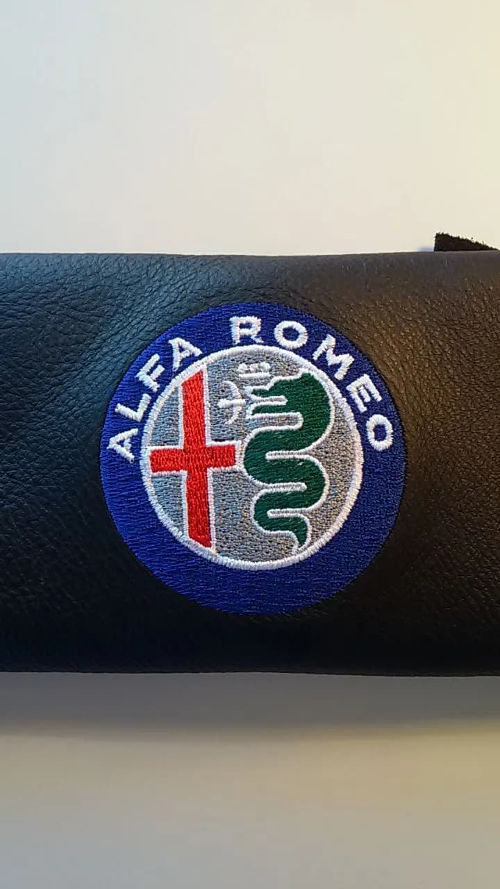 Alfa Romeo logo embroidered on a leather panel