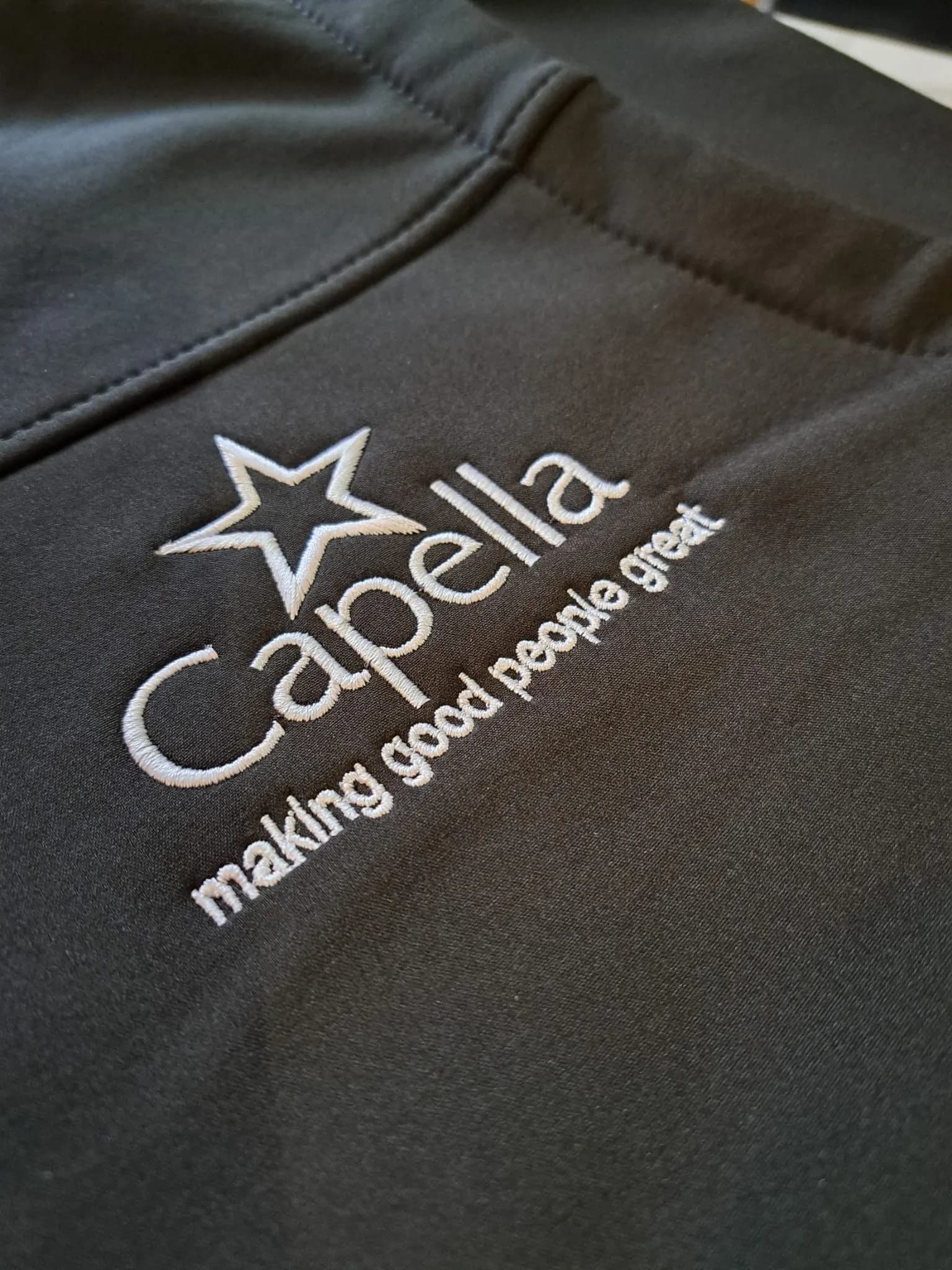 Capella logo embroidered on a softshell jacket