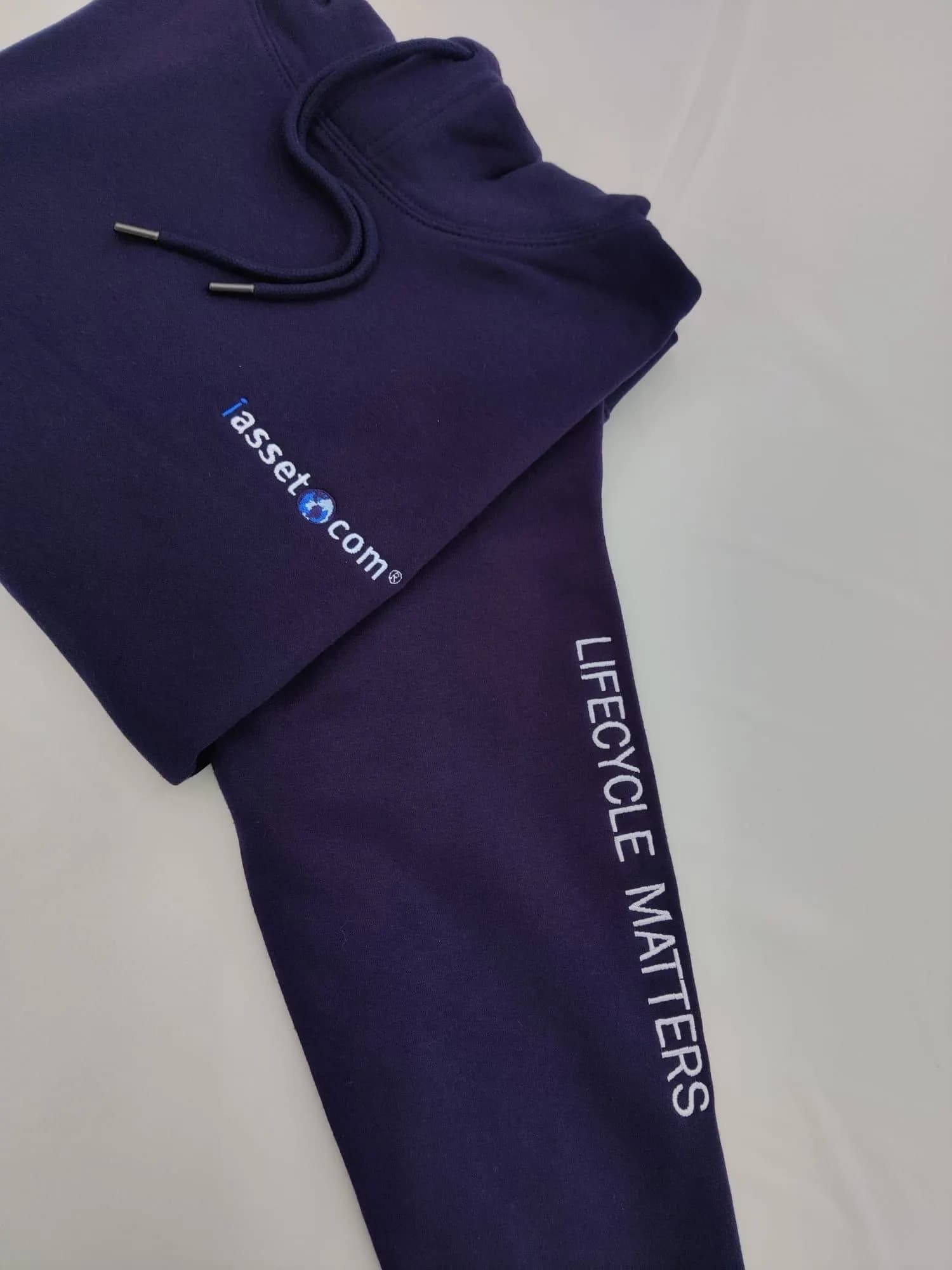 Sleeve embroidery detail on an Iasset hoodie