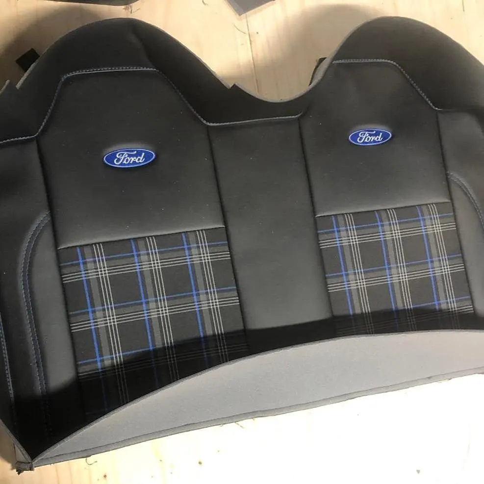 Embroidered seat panels for a Ford campervan