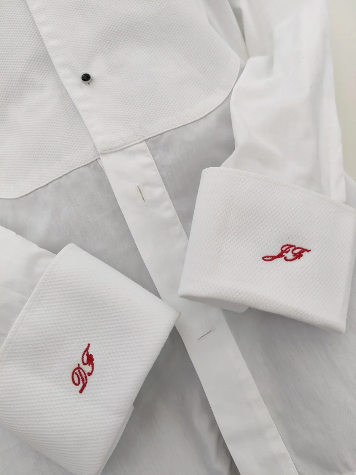 Initials embroidered on a gent's shirt cuff