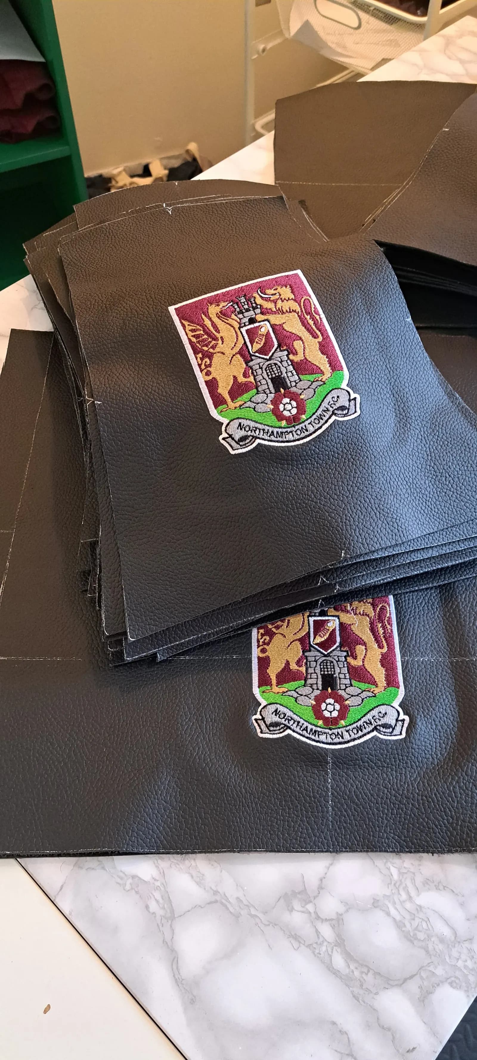 Leather headrest panels embroidered with the Northampton Town FC crest
