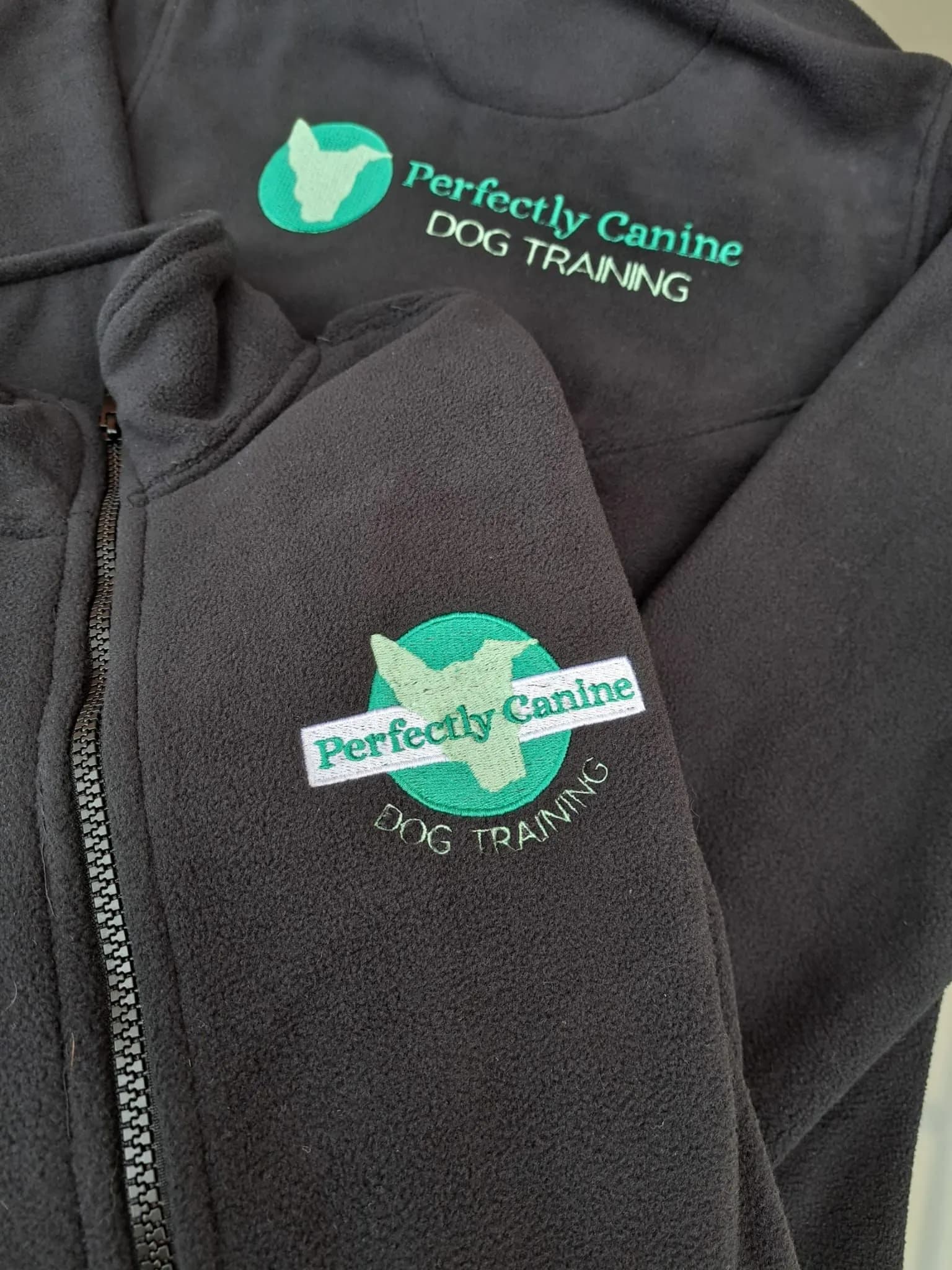 Perfectly Canine dog training logo on a fleece