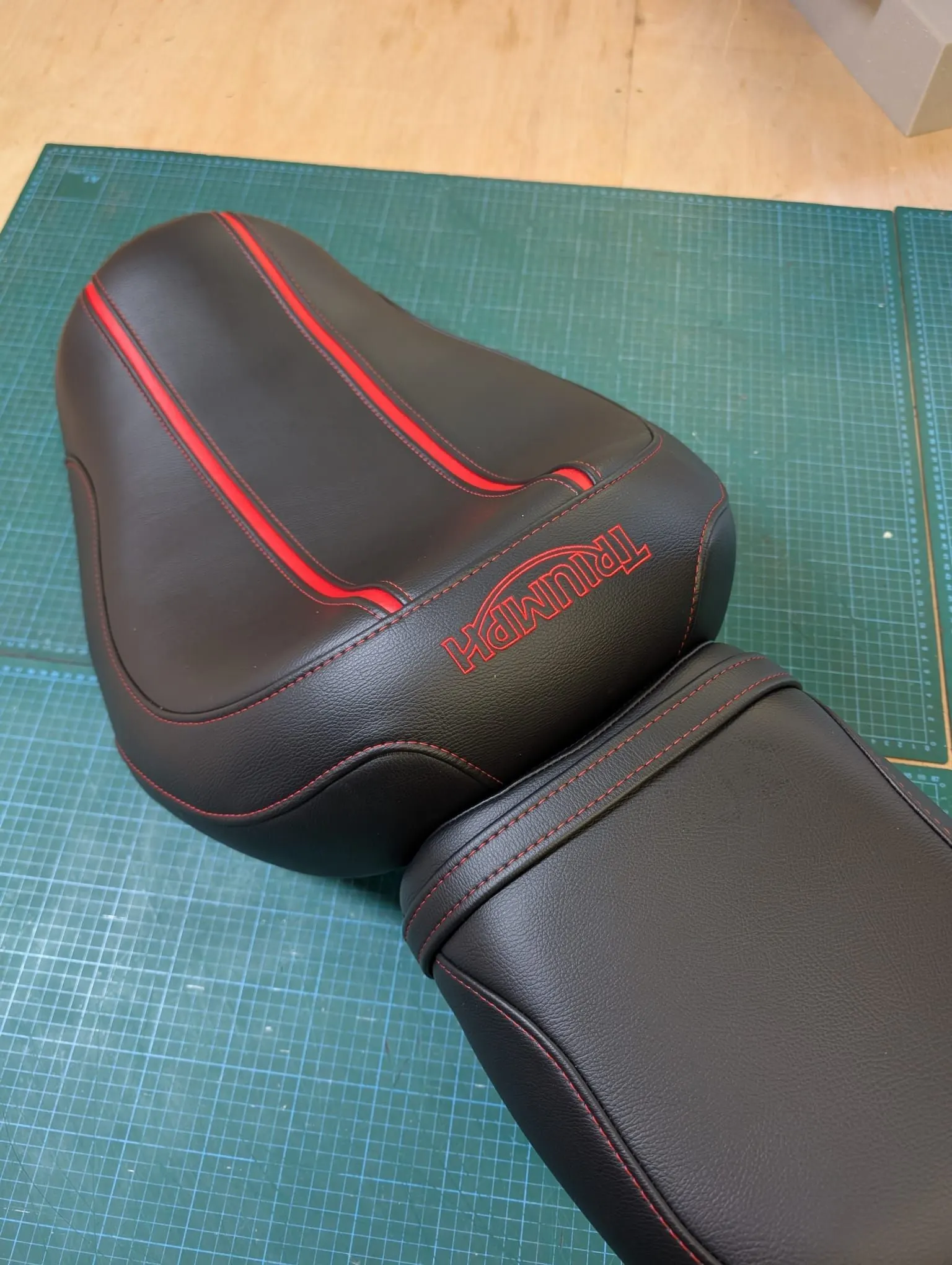 Custom embroidered Triumph motorcycle seat